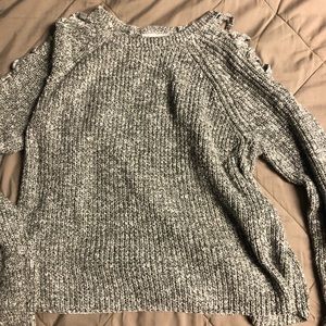 Sweater with open shoulders